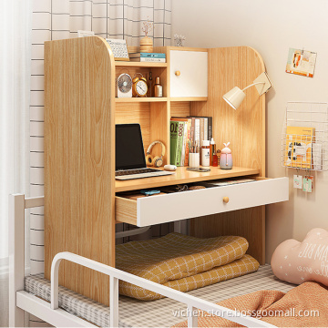 student dormitory desk on bed